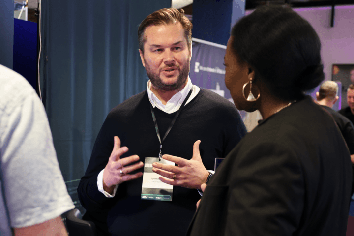 Lyle discussing tech with a potential client